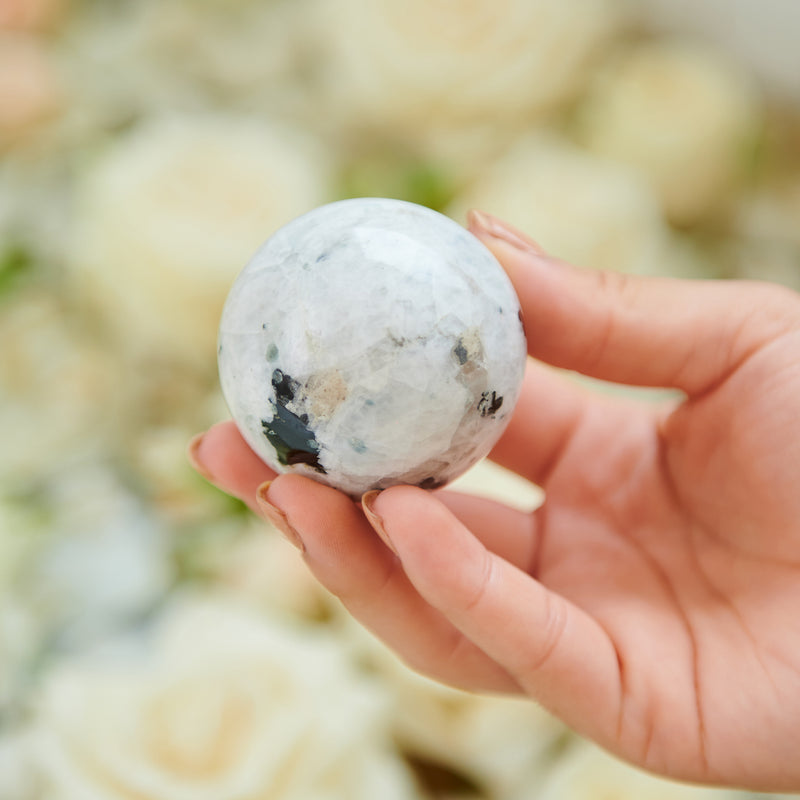 moonstone sphere in hand
